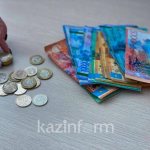 How much have pensions and state benefits increased in Kazakhstan?